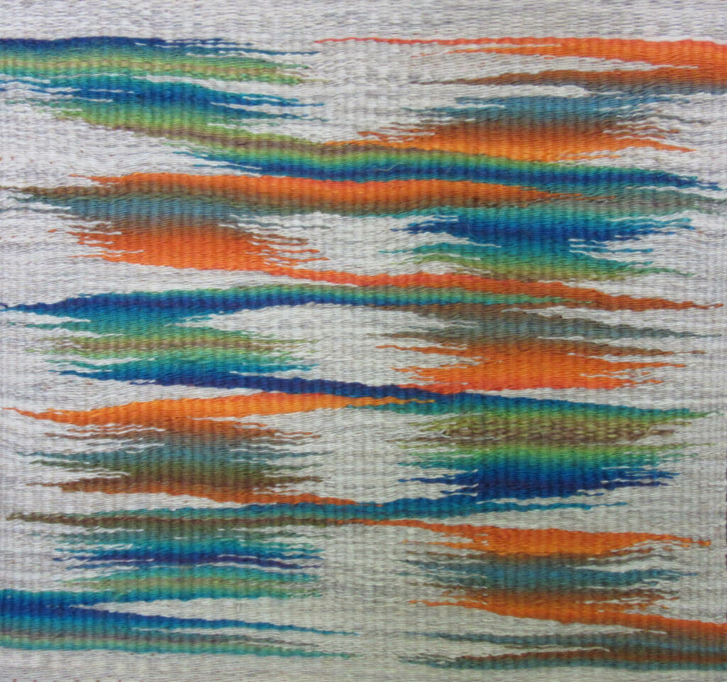 A colorful weaving with a zigzag pattern