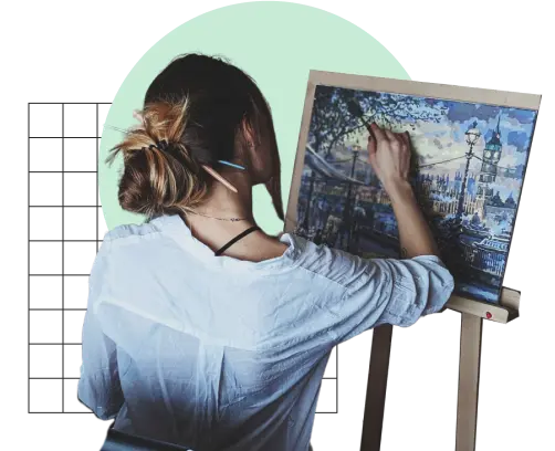 Painter working on a painting on an easel