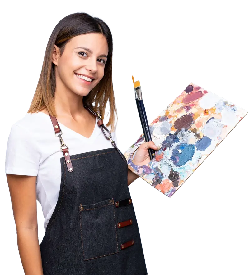 Young woman smiling, holding paintbrush and palette