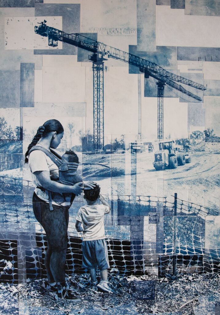 A woman with two children watches a construction site with cranes and machinery behind a fence.